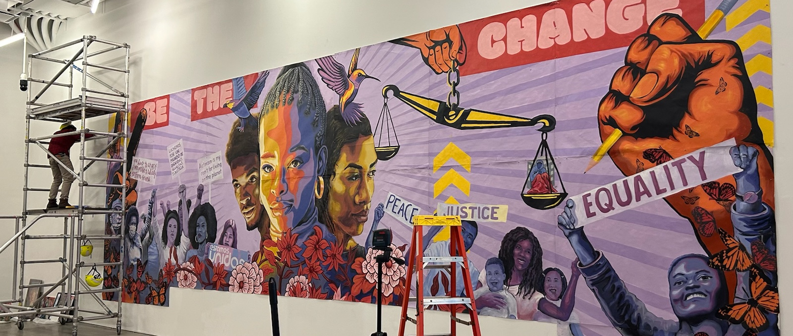 Be the Change mural being installed at BRIC